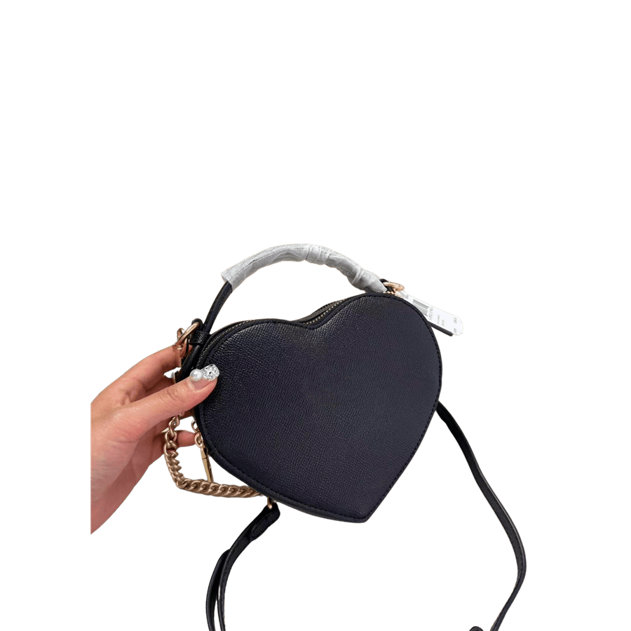 Black heart-shaped ladies crossbody bag with top zipper closure