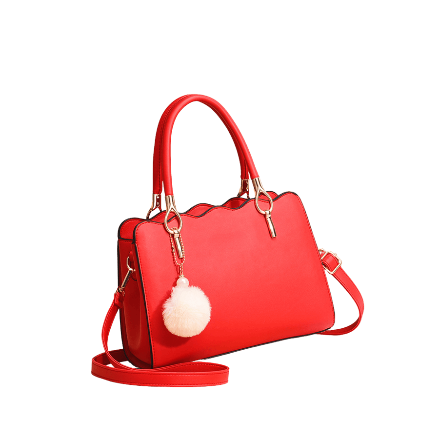 Red ladies handbag with pompom hangtag with metal tab of the handle