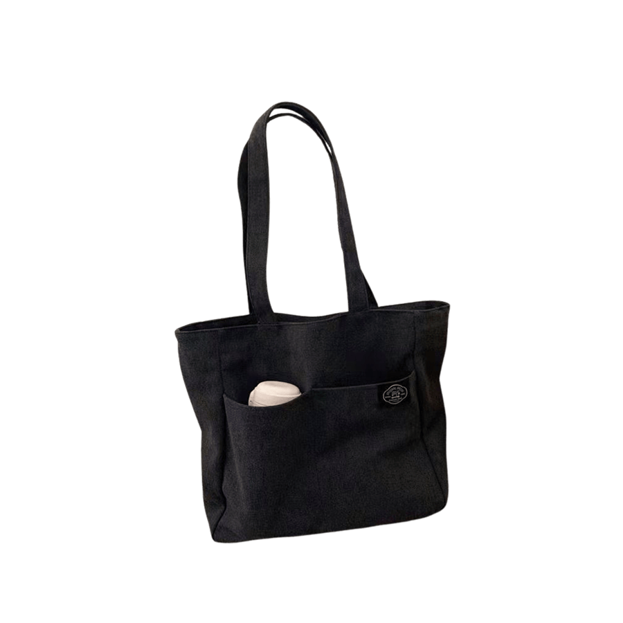 Black ladies canvas tote with front open pockets