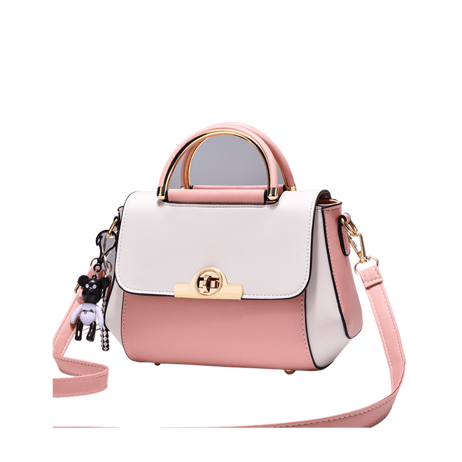 Pink ladies handbag with metal handle and detachable toy hangtag