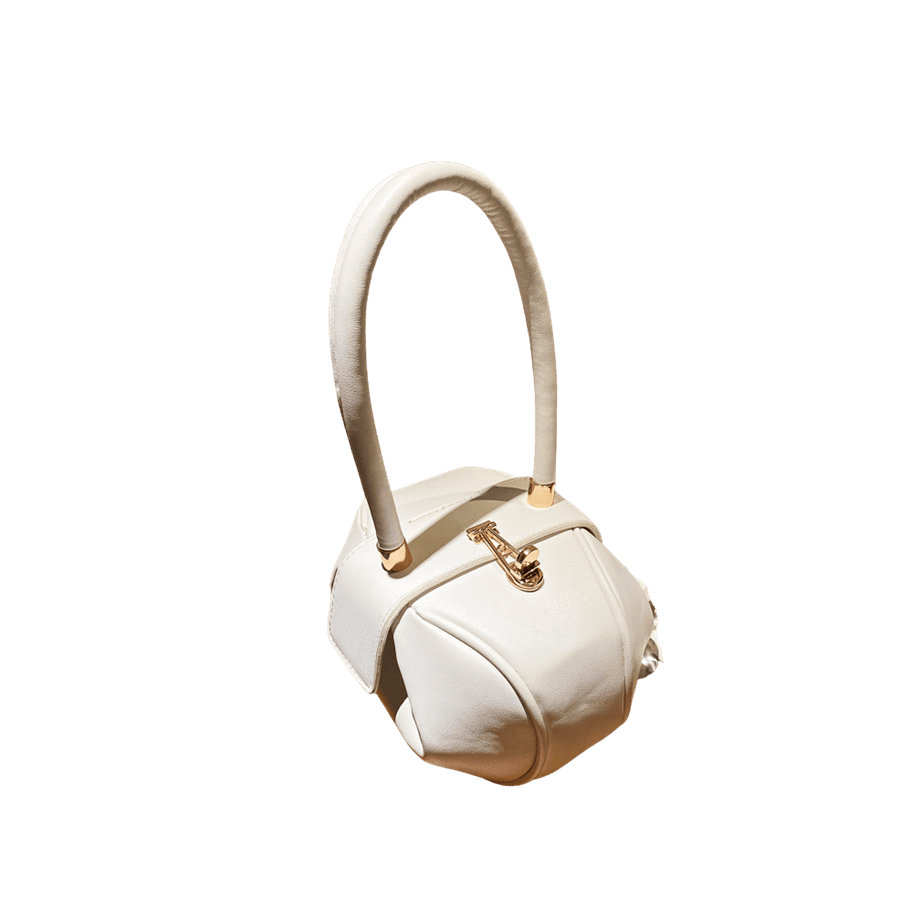White ladies clultch with lock closure and metal tubular on the handle