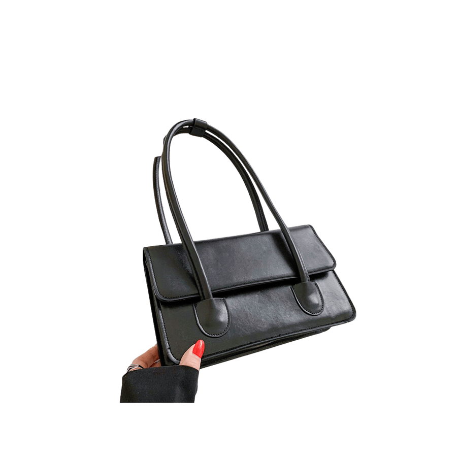 Black ladies handbag with magnetic snap closure