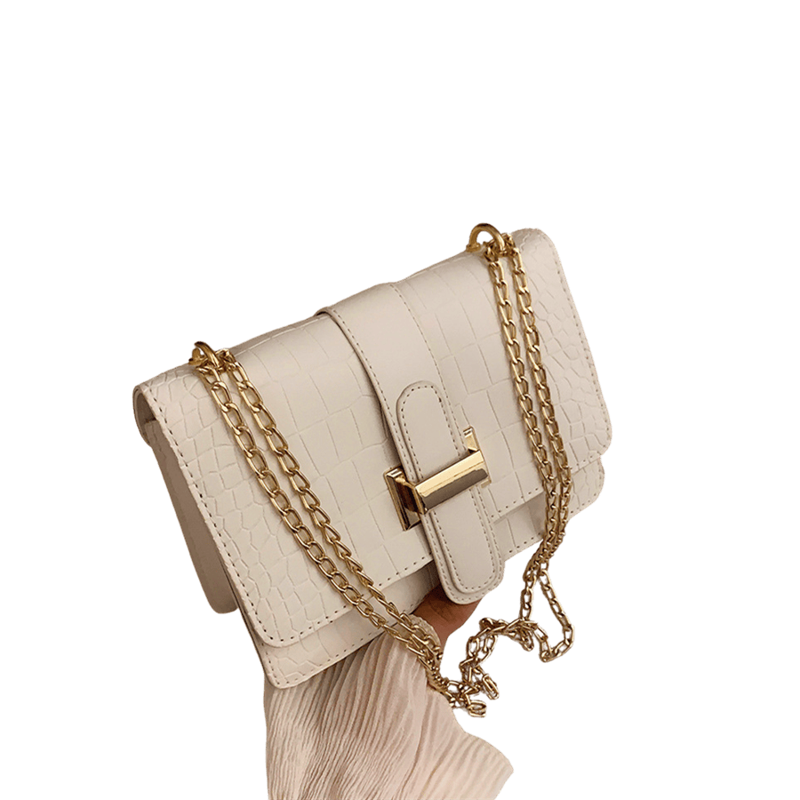 White croco PU ladies handbag with metal bridge on the flap and magnetic snap closure