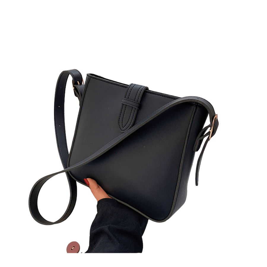 Black ladies crossbody bag with adjustable strap and strap closure