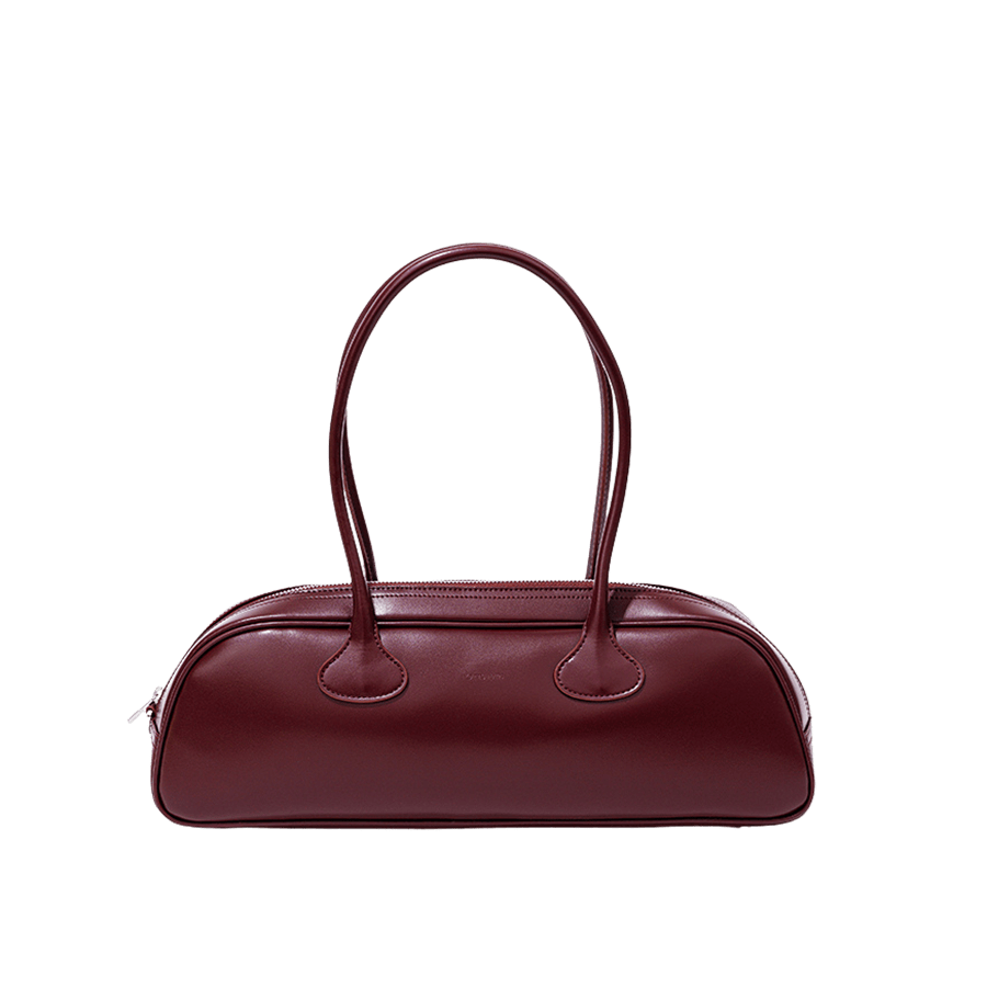 Burgundy ladies handbag with piping around the body
