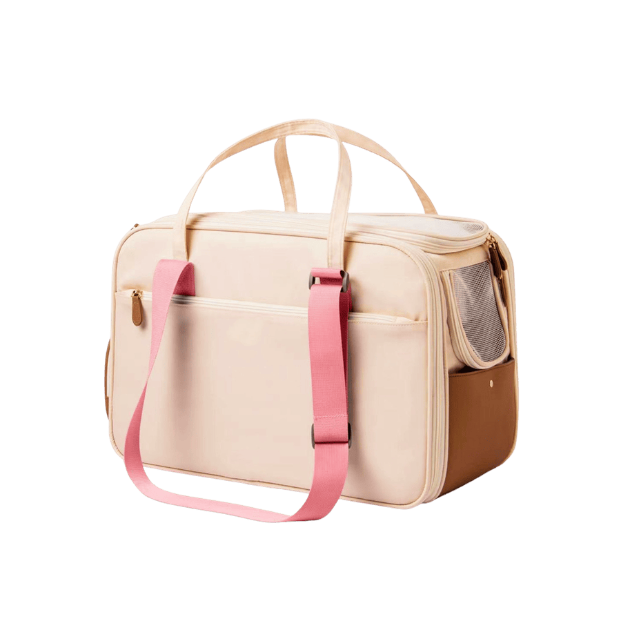 Beige pet bag with pink shoulder strap and mesh pocket