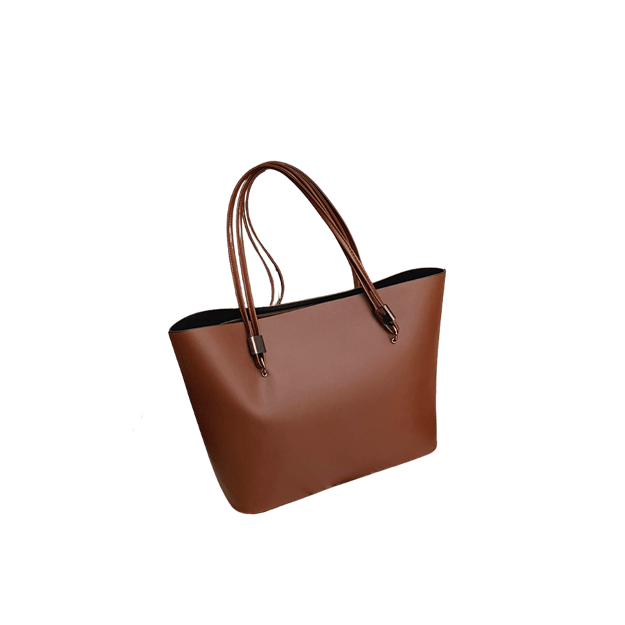 Brown ladies tote bag with metal tab of the handle and string handle