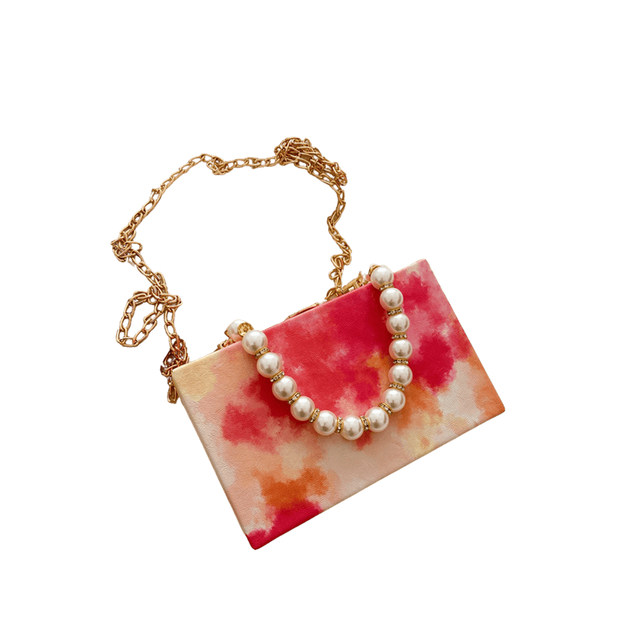 Gradient red ladies box clutch with pearl handle and frame closure