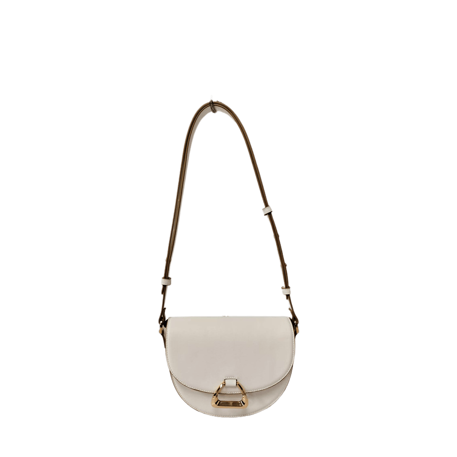 White ladies crossbody bag with decorative  hardware on the flap and contrast edge painting