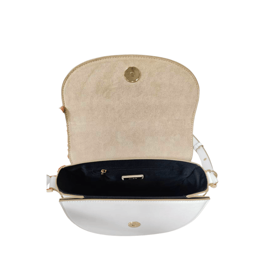 White ladies crossbody bag with decorative  hardware on the flap and contrast edge painting