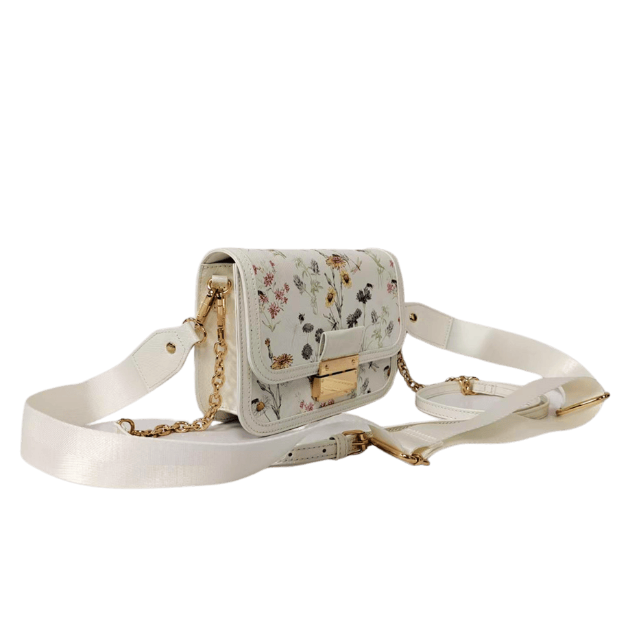 Crossbody bag with lock closure and metal plate on the back