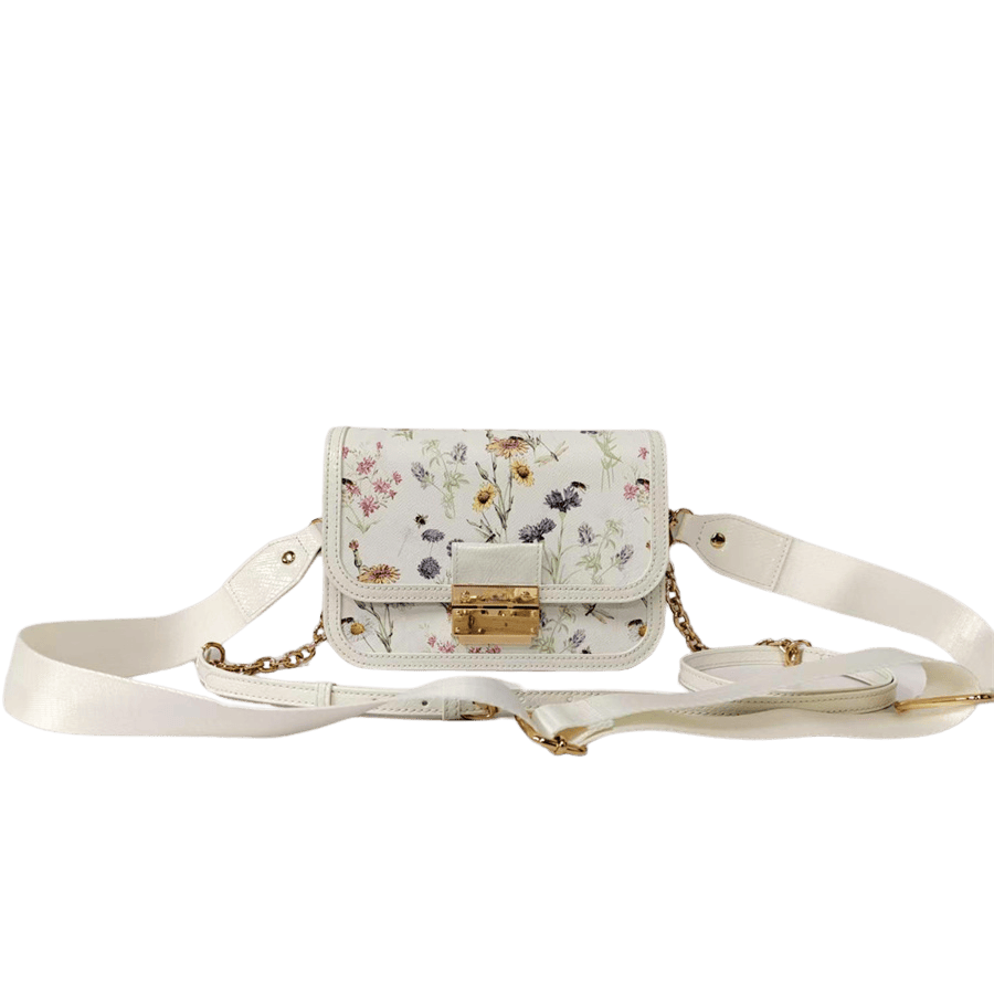 Crossbody bag with lock closure and metal plate on the back