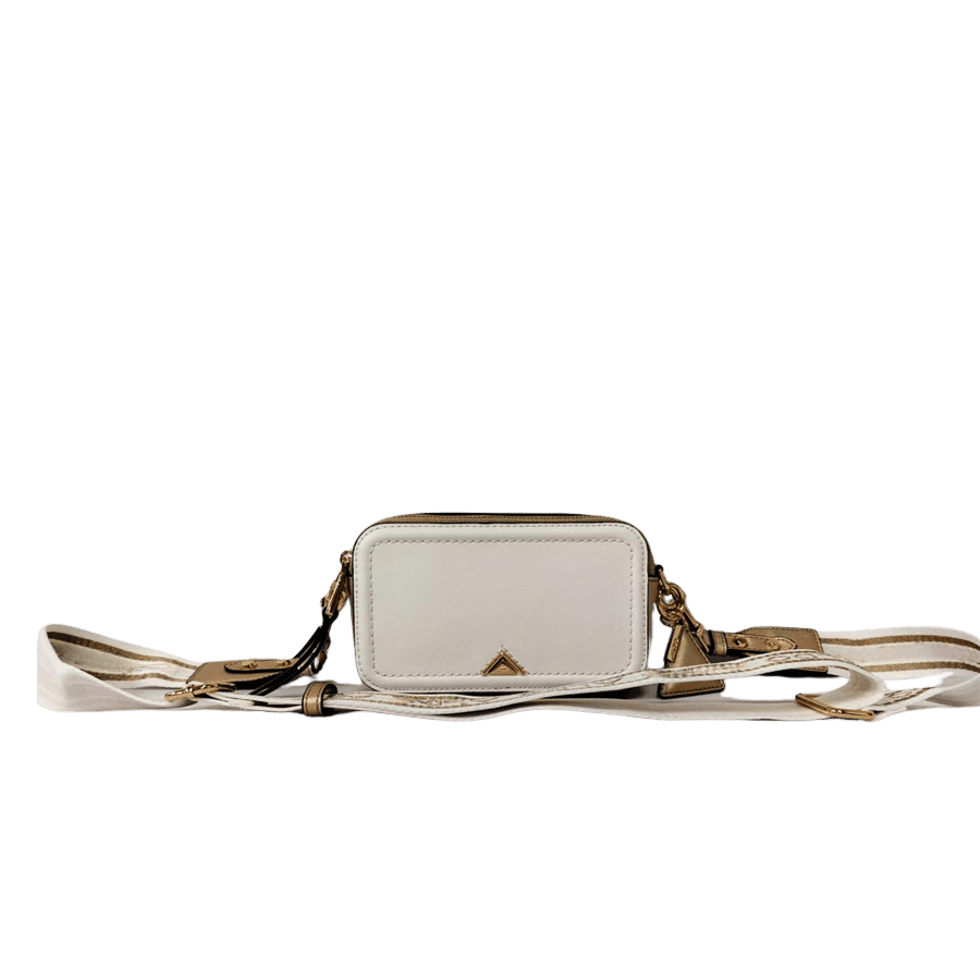 Ladies crossbody with decorative triangle hardware and card pocket on the back