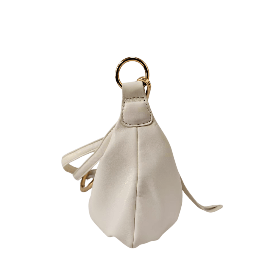 White ladies handbag with metal ring handle and long zip puller