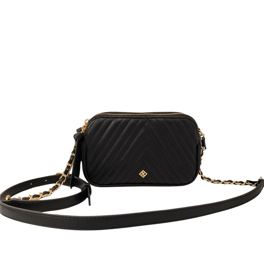 Black quilting ladies crossbody bag with decorative hardware and top zip closure