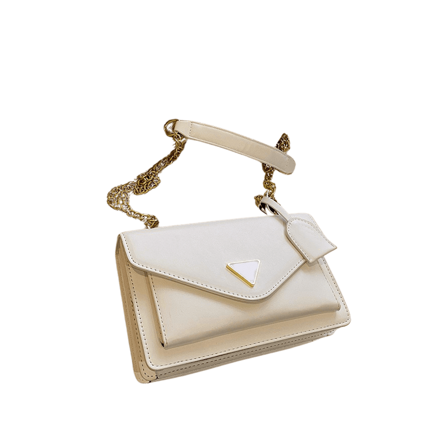 Beige ladies handbag with triangle metal plate and detachable PU hangtag