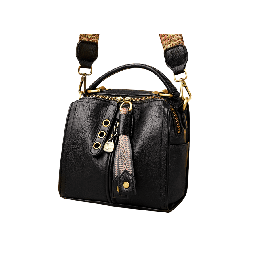 Black ladies handbag with long puller zipper puller and middle zipper
