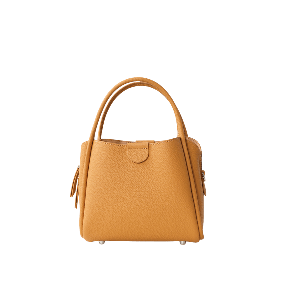 Yellow ladies handbag with metal feets and magnetic snap closure