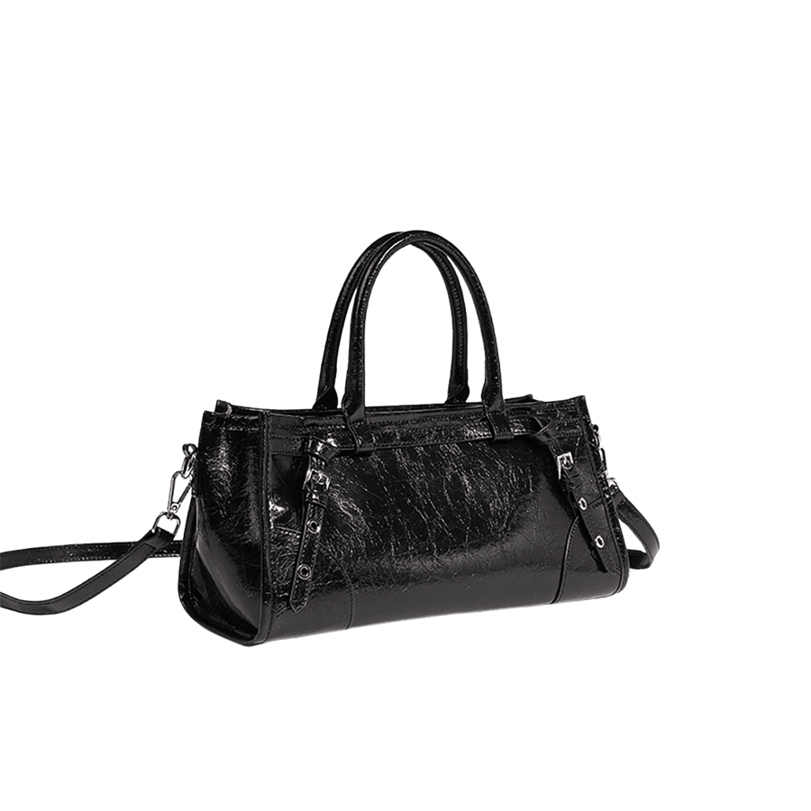 Black ladies handbag with decorative straps and PU corner