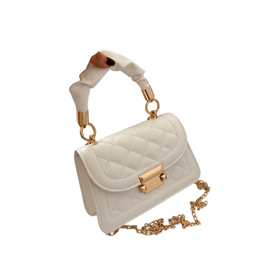 Beige ladies quilting handbag with plicated handle and lock closure