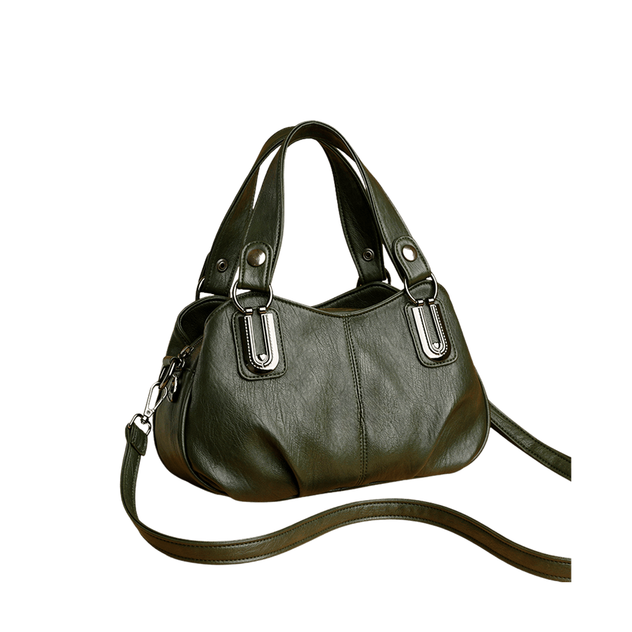 Green ladies handbag with metal tab of the handle and middle stitching