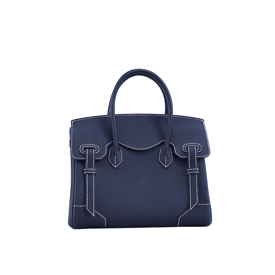 Navy ladies handbag with contrast stitching and decorative flap