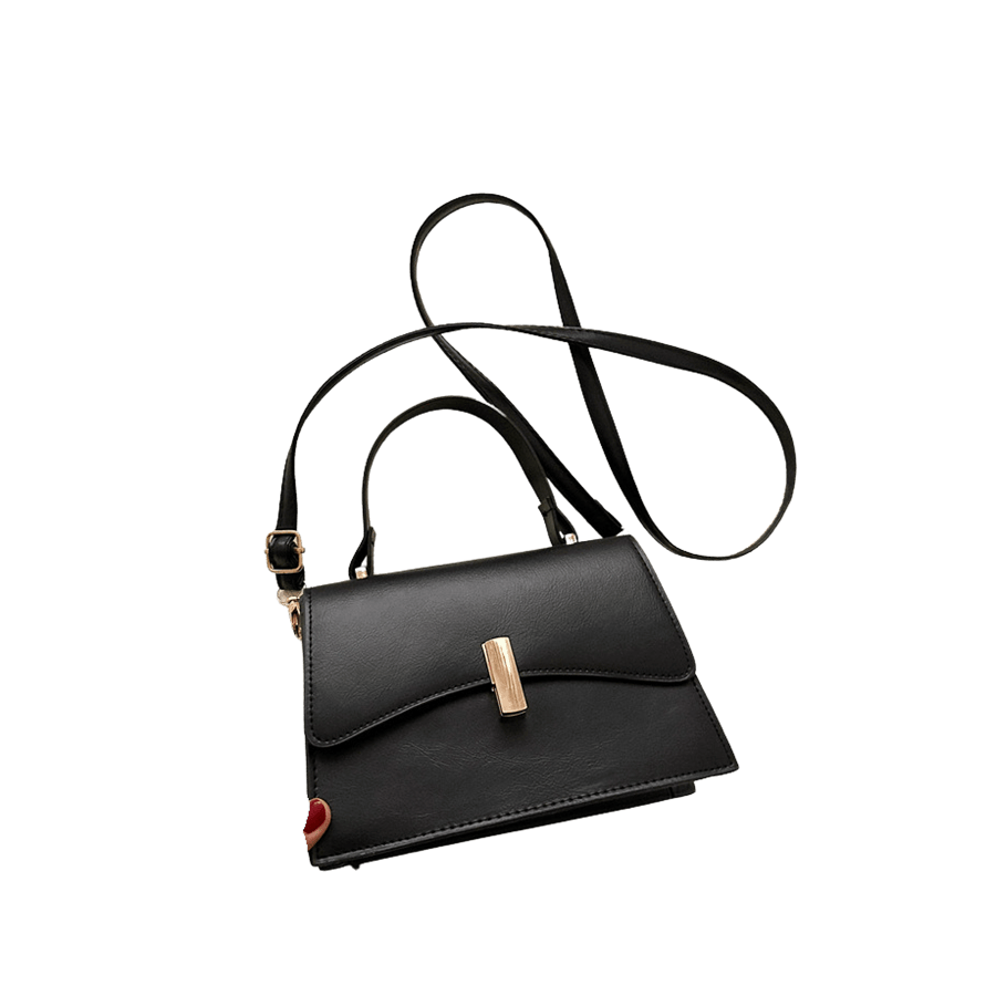 Black ladies handbag with lock closure and metal bridge on the top