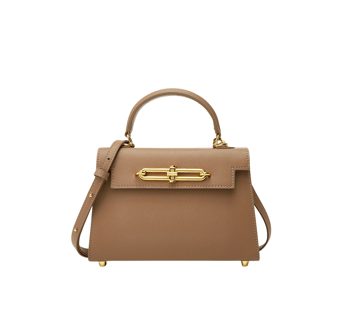 Camel ladies handbag with lock closure and metal feets on the bottom
