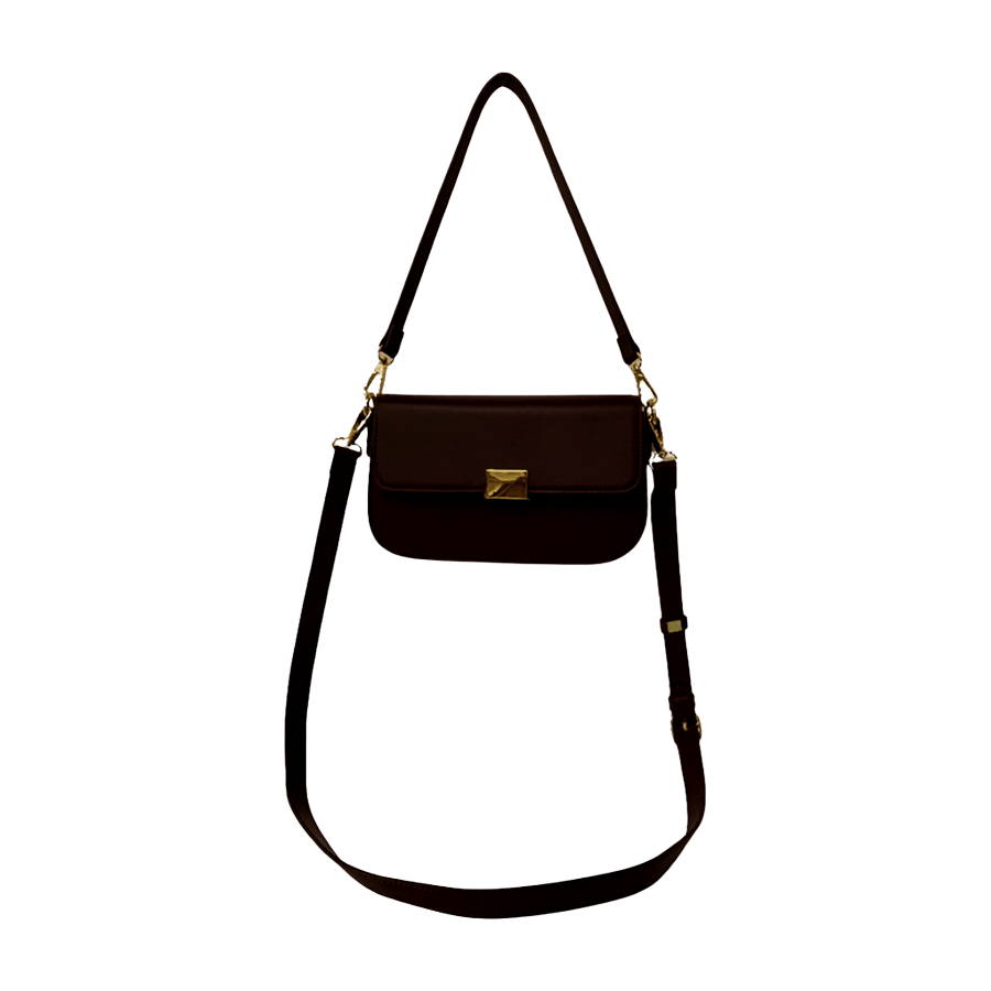 Black ladies handbag with metal plate on the flap