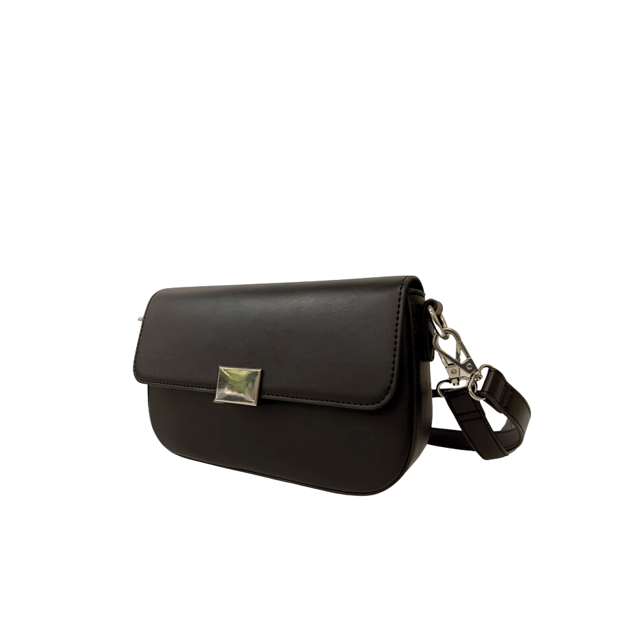 Black ladies handbag with metal plate on the flap