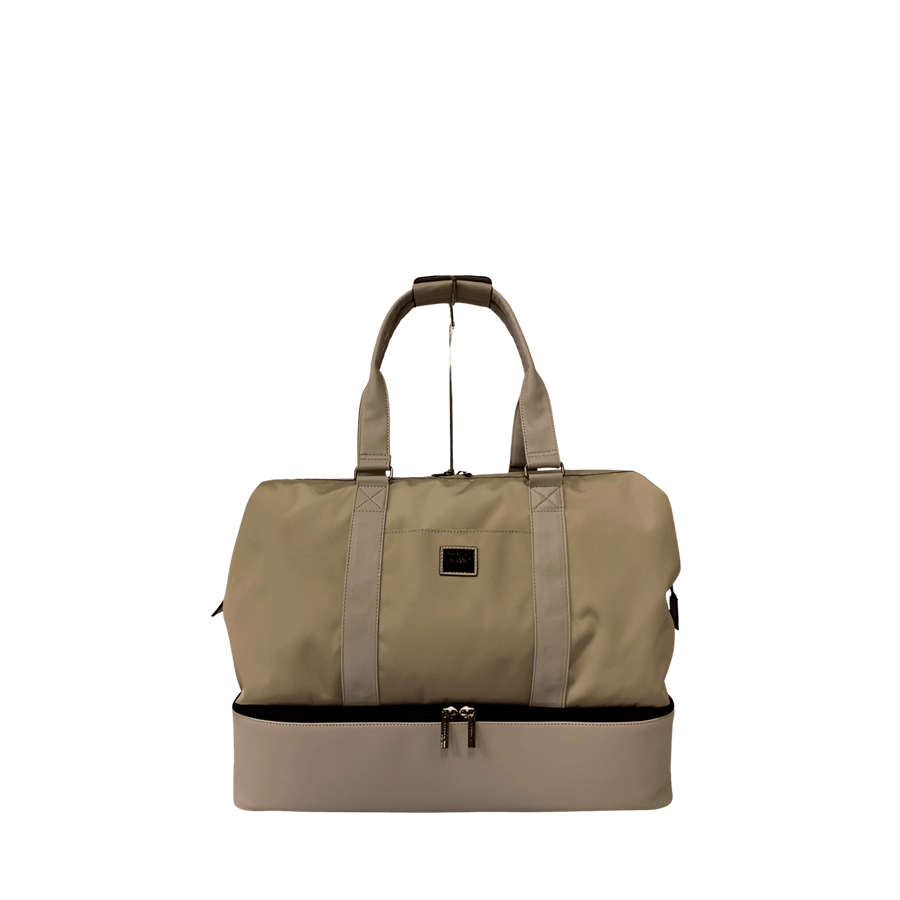 Ladies travelling tote with bottom pocket and back strap to attached luggage