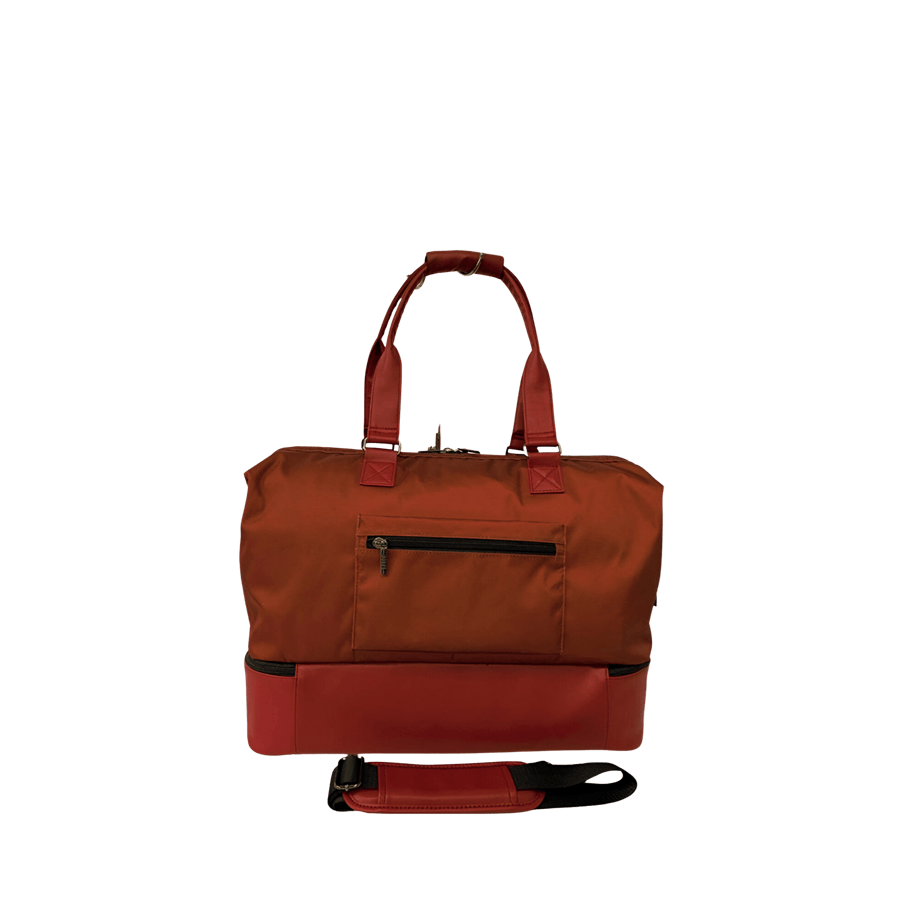 Ladies travelling tote with bottom pocket and back strap to attached luggage