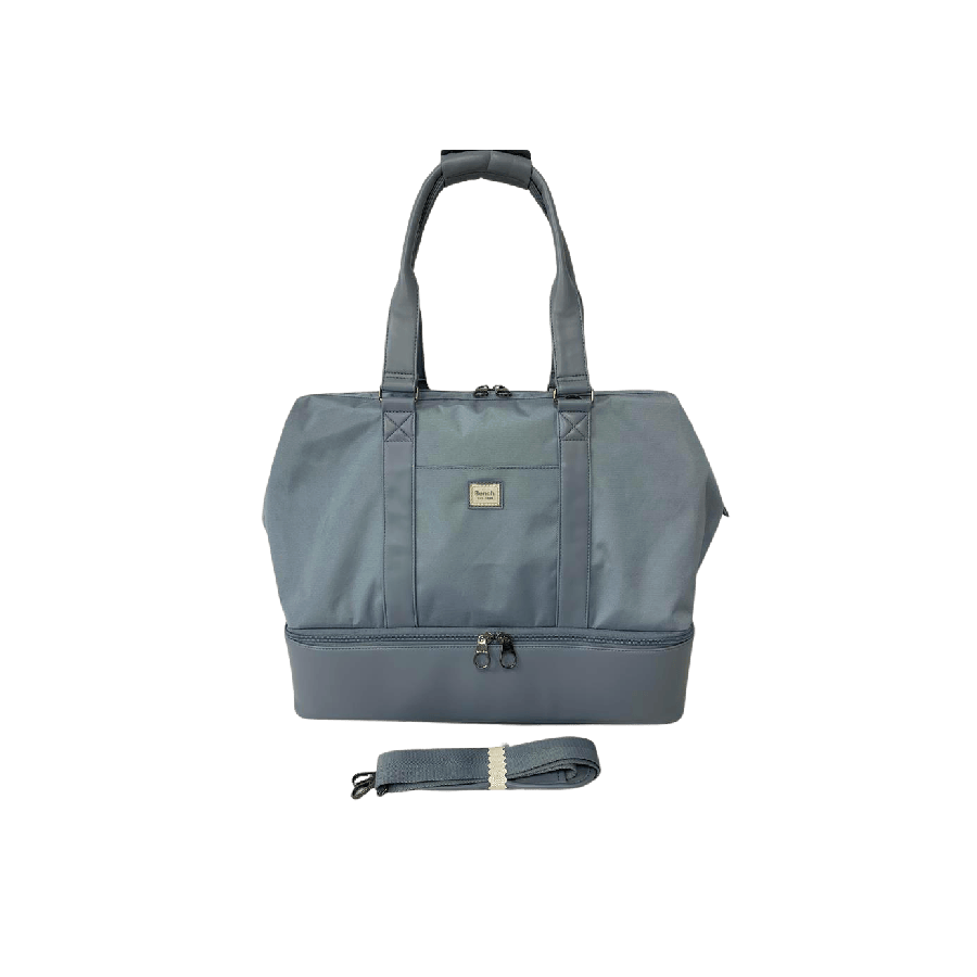 Ladies travelling tote with bottom pocket and back strap to attached luggage