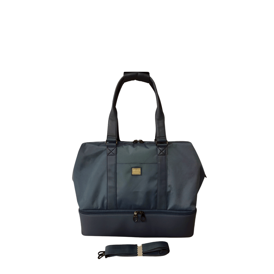 Ladies travelling tote with bottom pocket and back strap to attached luggage