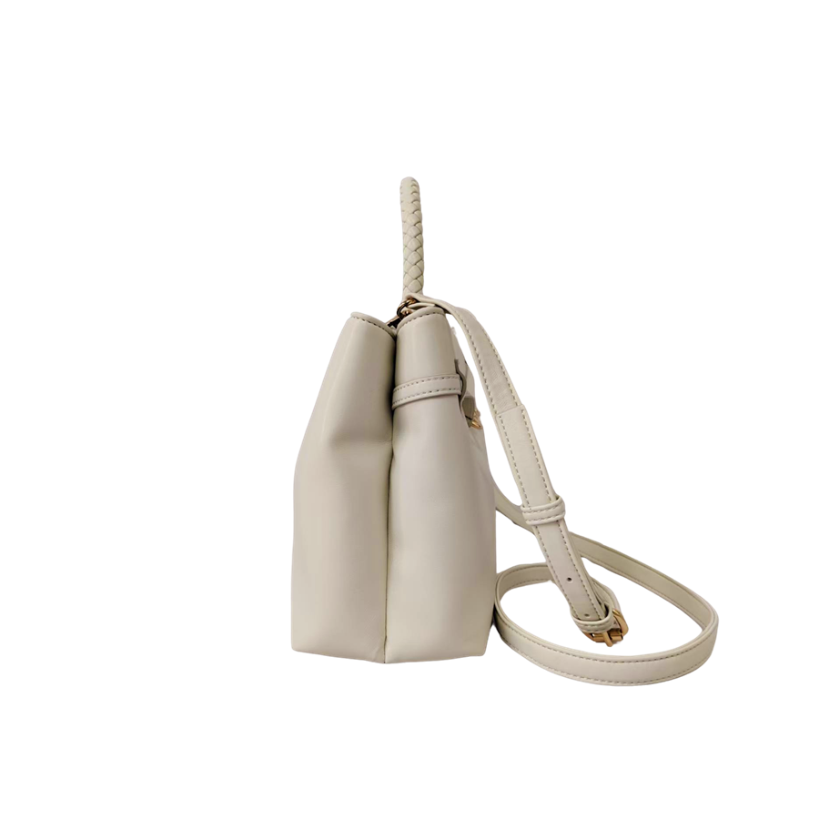 Beige ladies handbag with with decorative bowknot hardware and weave handle