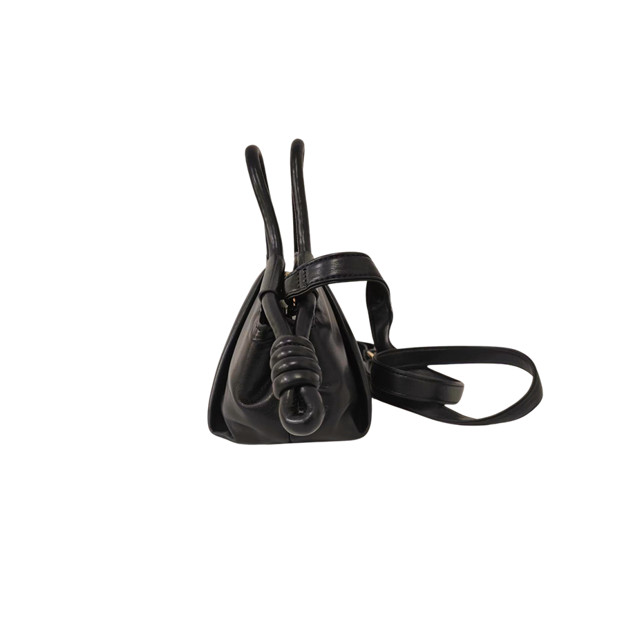 Black ladies handbag with pleats and knots on the handle