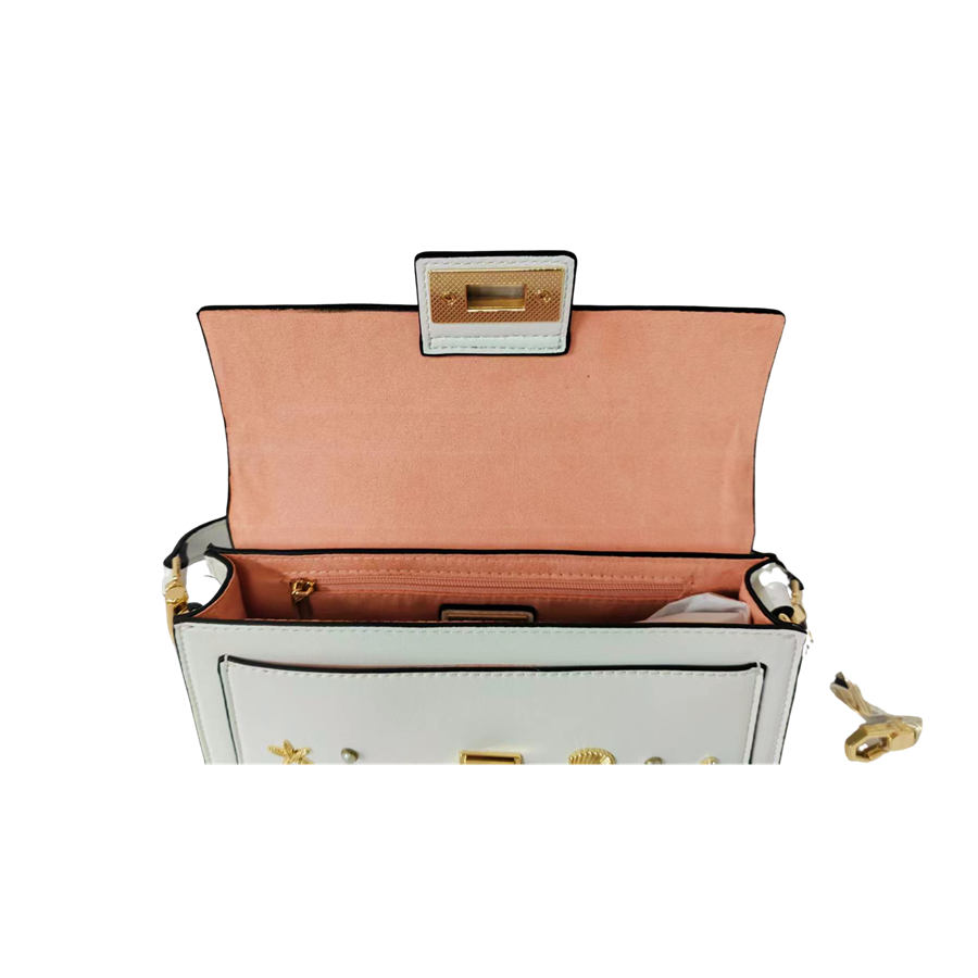 White ladies handbag with decorative accessories and black edge painting