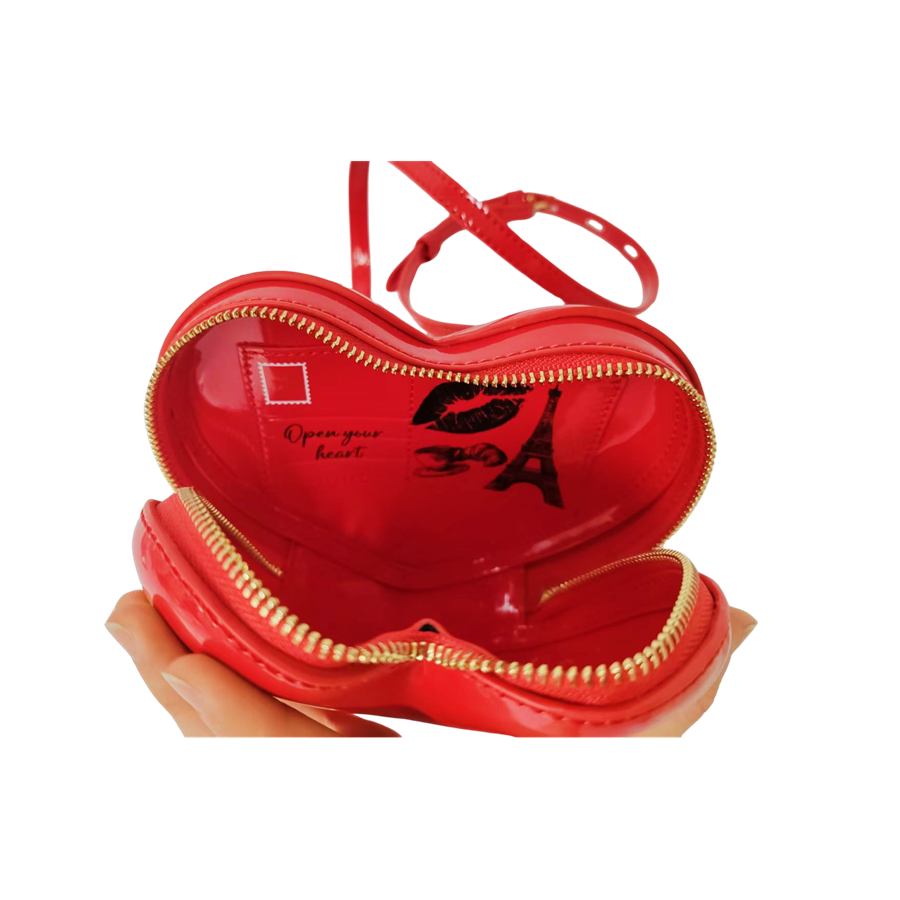Red patent PU ladies heart-shaped clutch with detachable metal hangtag and chain handle