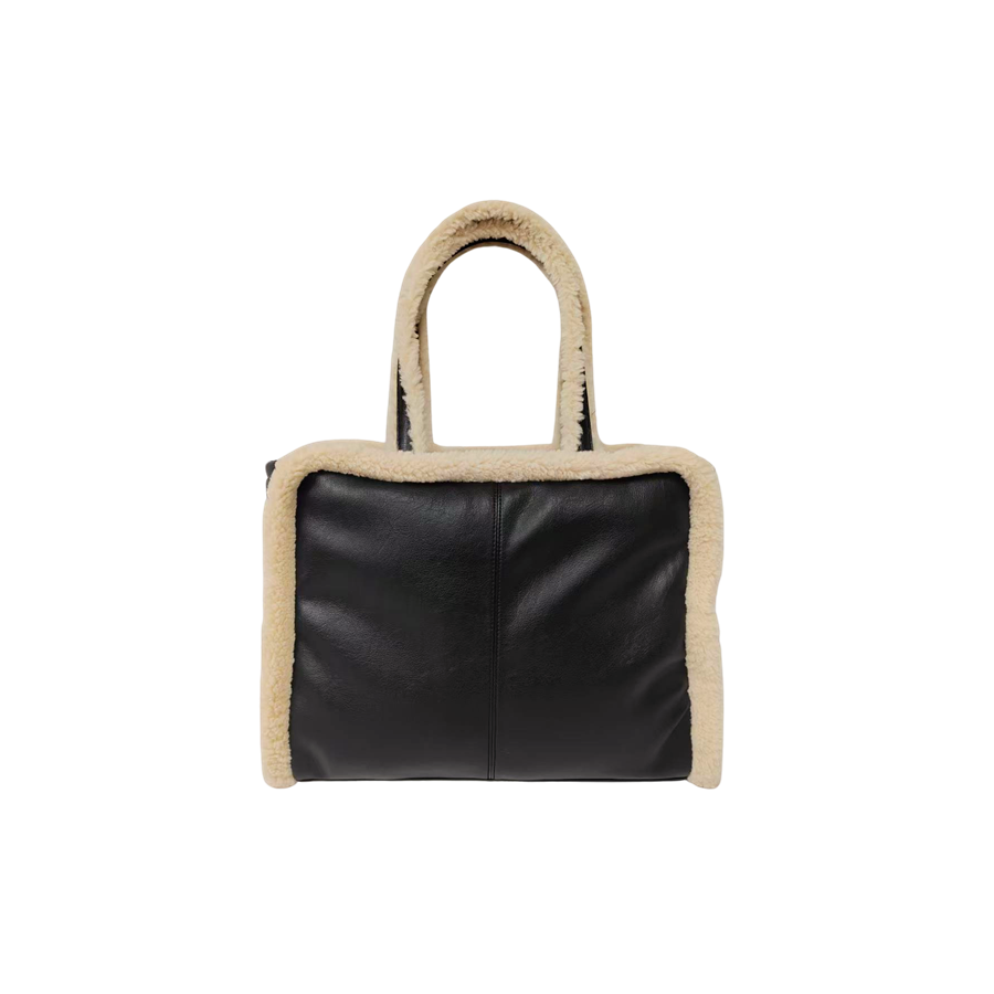 Black ladies tote bag with middle stitching and beige fake fur around the body