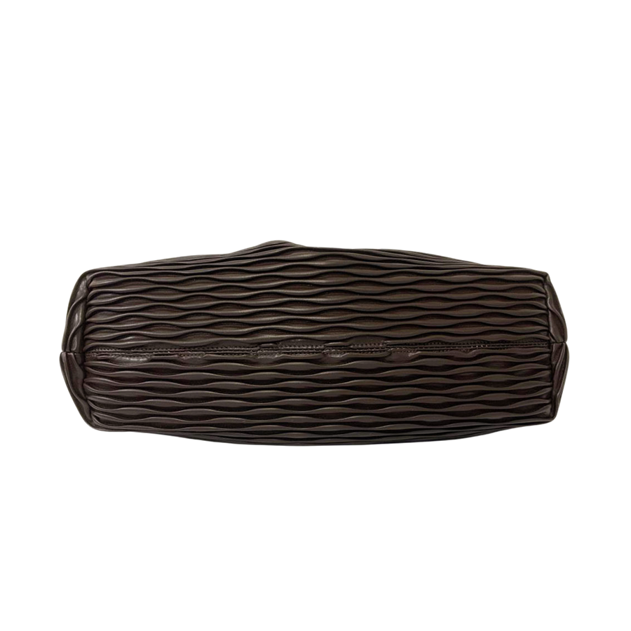 Brown ladies clutch bag with pleats on the body and frame closure