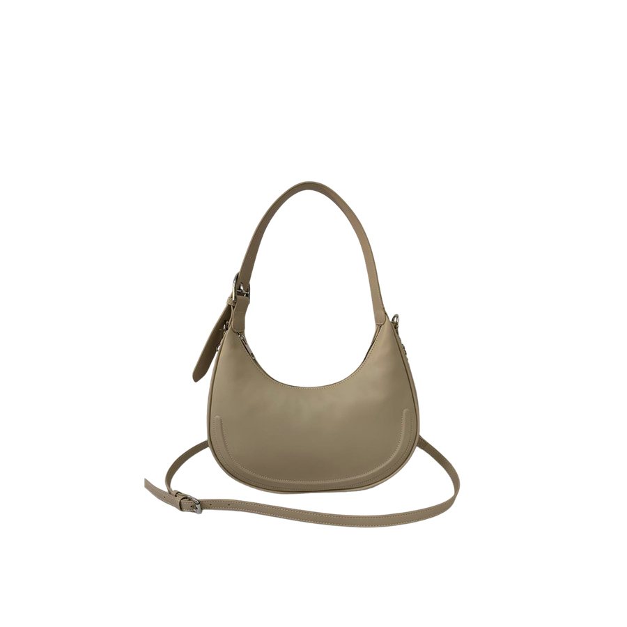 Beige ladies handbag with adjustable handle and decorative bombe on the body