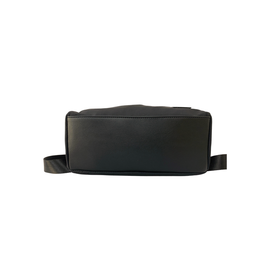 Black ladies backpack with decorative pleats and black trim PU