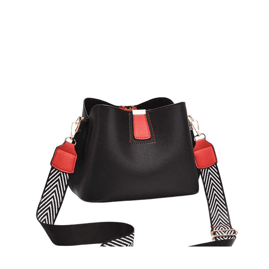 Black ladies bucket bag with jacquard webbing on the shoulder strap and magnetic snap closure