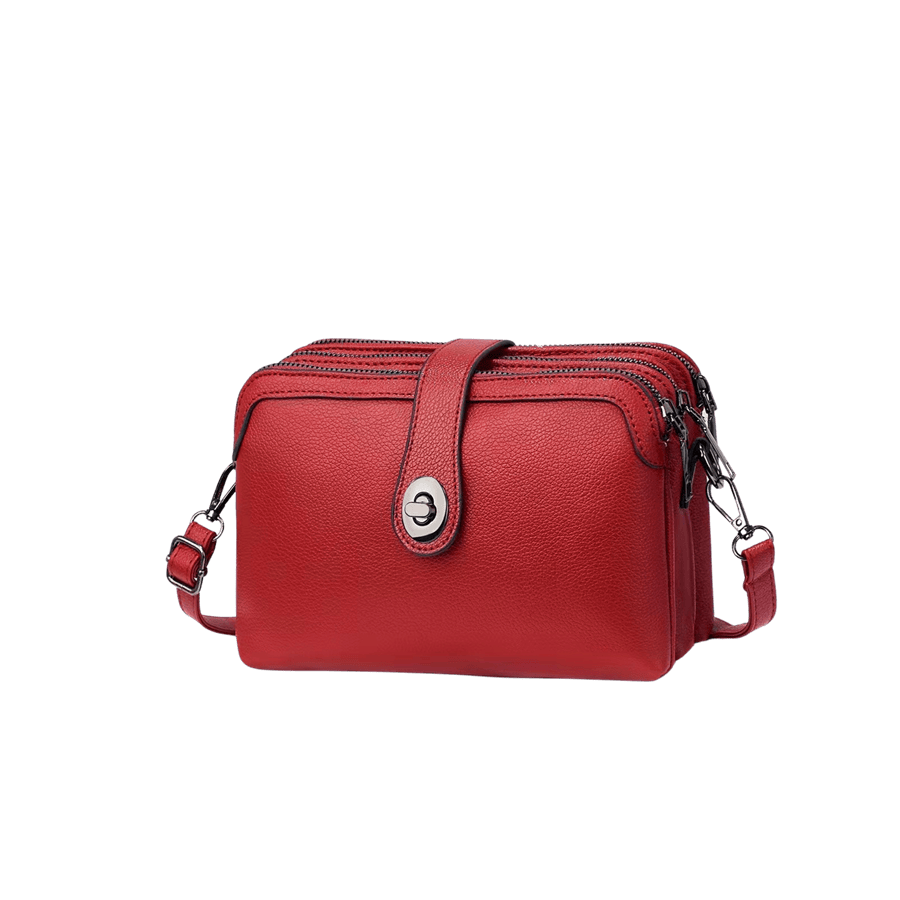 Red ladies crossbody bag with lock closure and contrast edge painting