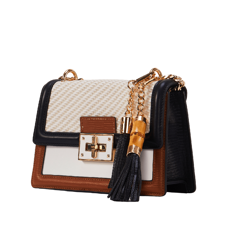 Ladies handbag with decorative tassel and lock closure