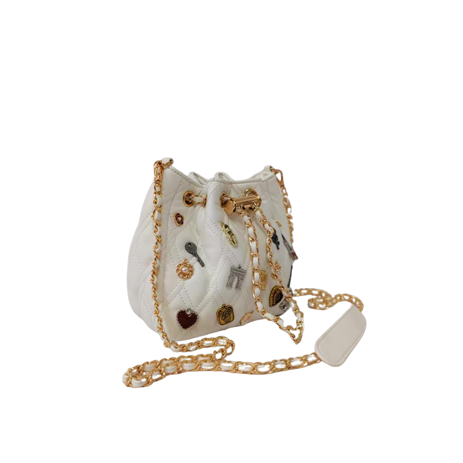 White quilting ladies drawstring bag with decorative accessories and metal stopper