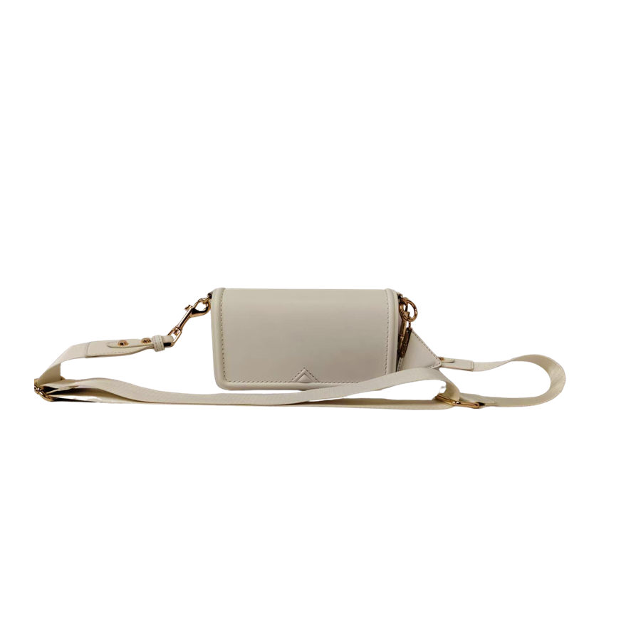 Beige ladies crossbody bag with decorative bombe and magnetic snap closure