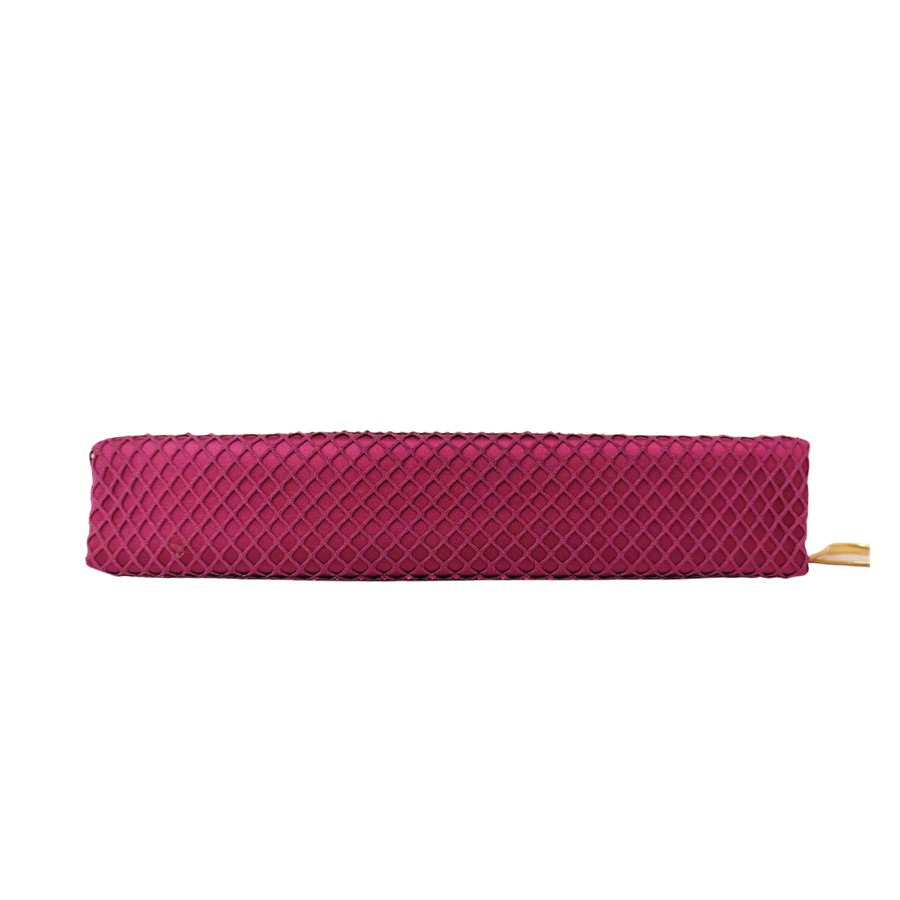 Burgundy ladies clutch bag with matching mesh on the surface and metal frame closure