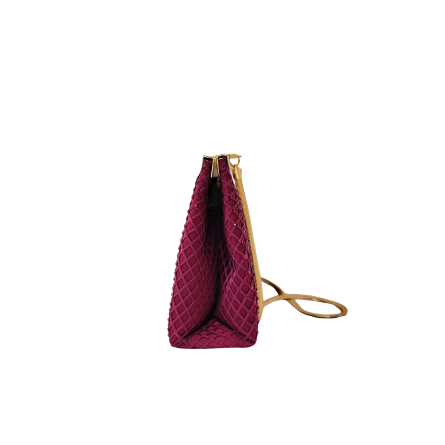 Burgundy ladies clutch bag with matching mesh on the surface and metal frame closure